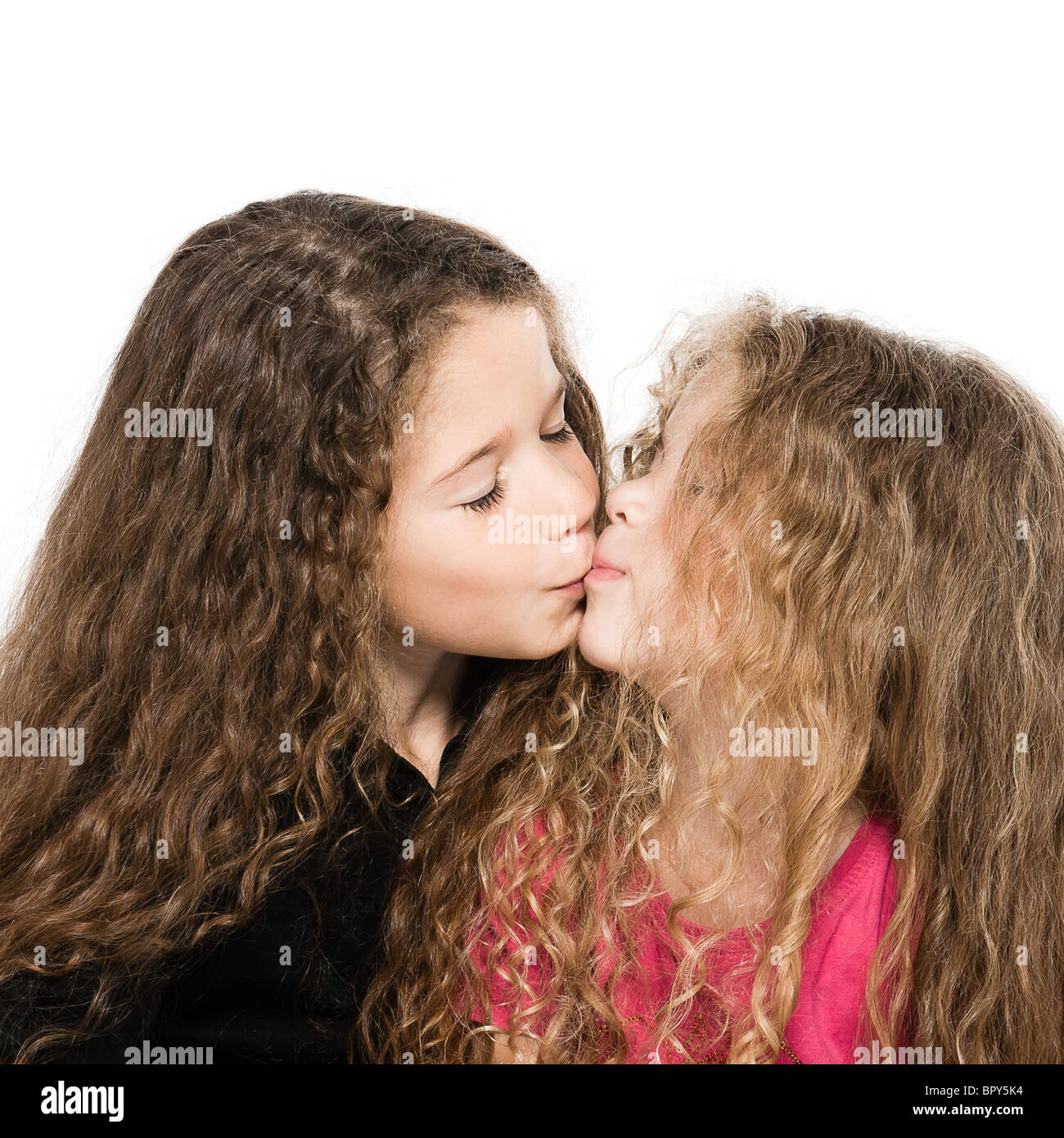 Two Caucasian Little Girls Portrait Kissing Isolated Studio On White Background Stock Photo Alamy